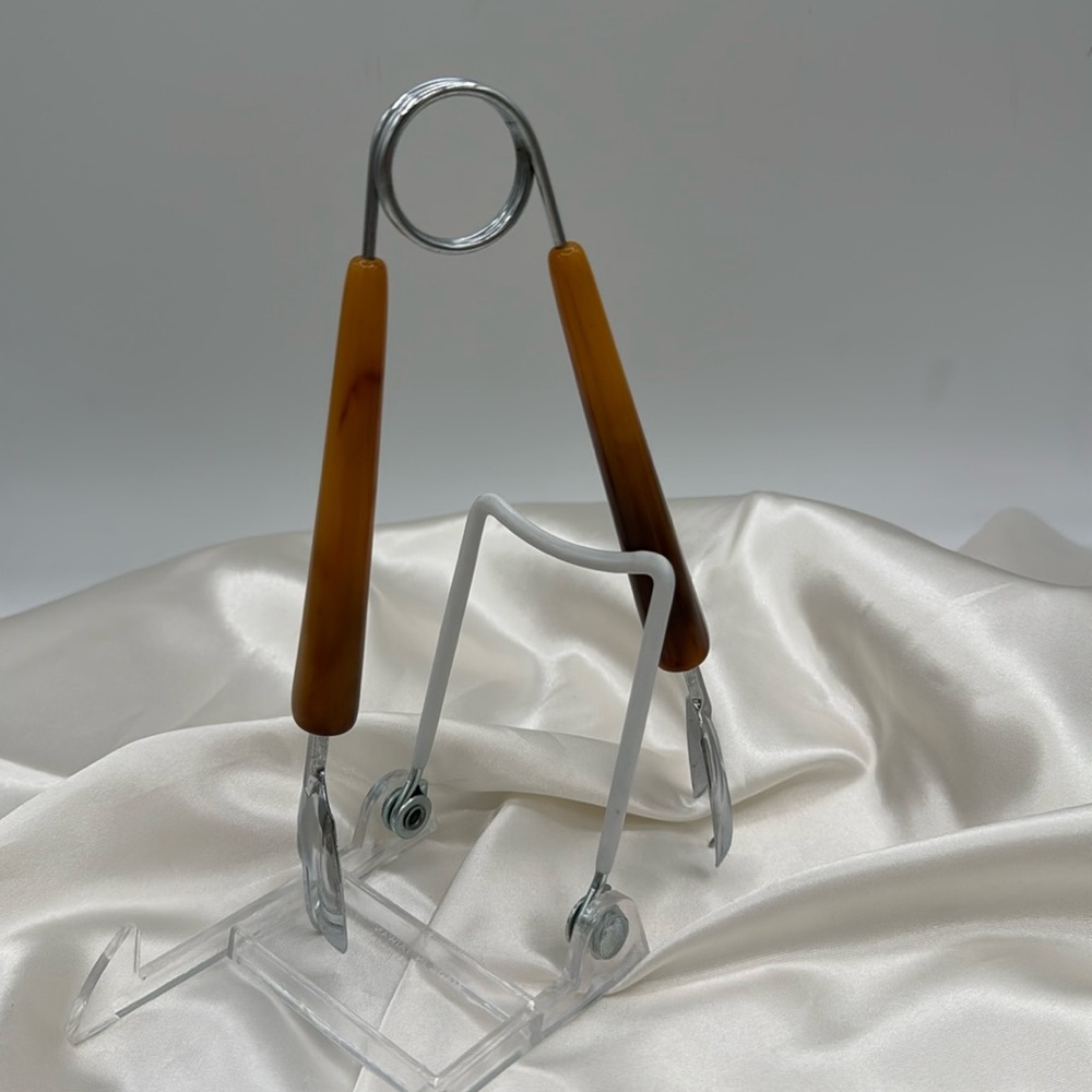 MCM Ice Tongs with Butterscotch Bakelite Handles.